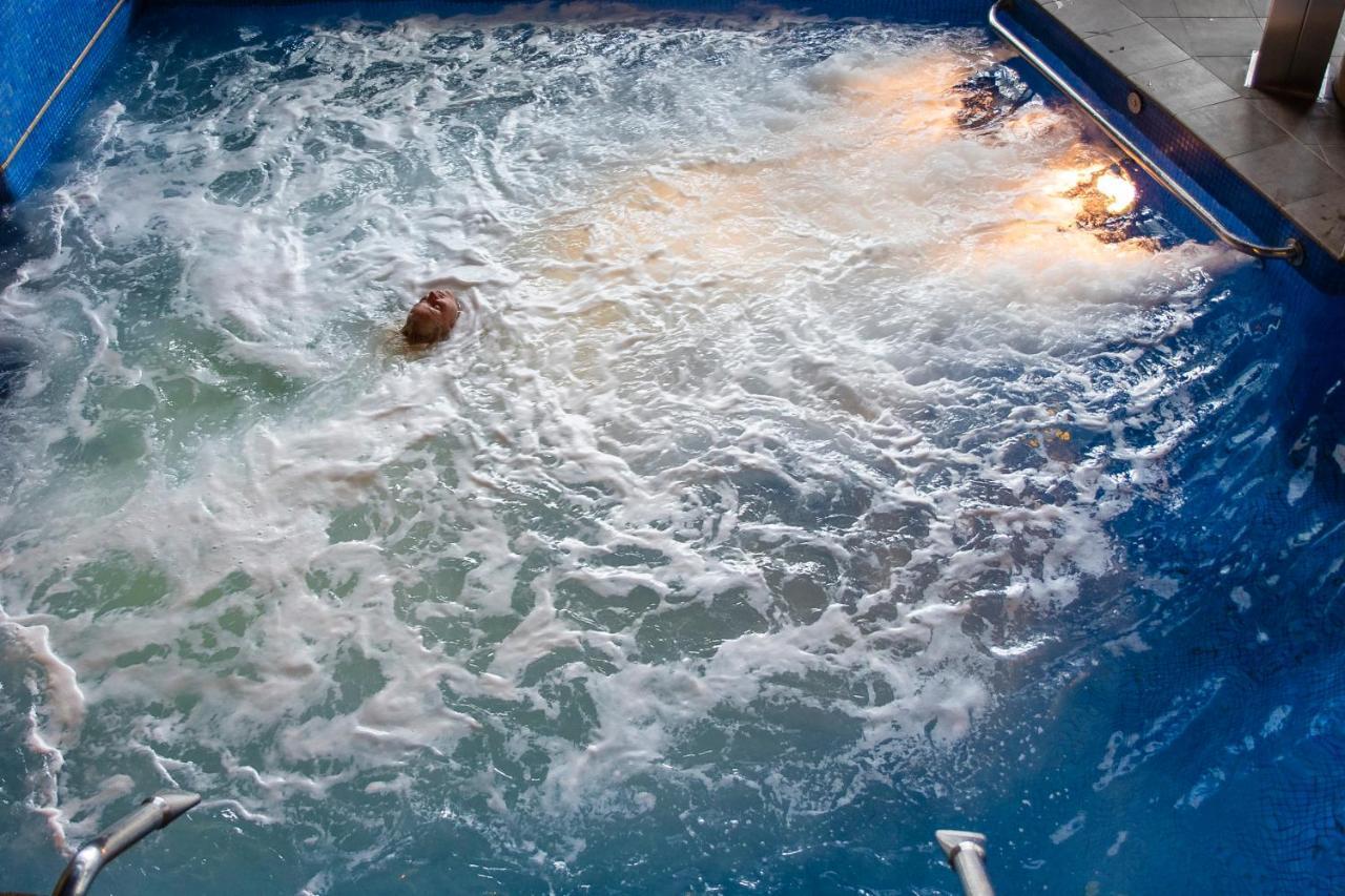 Sant Jordi Boutique Hotel Calella Exterior foto A whirlpool