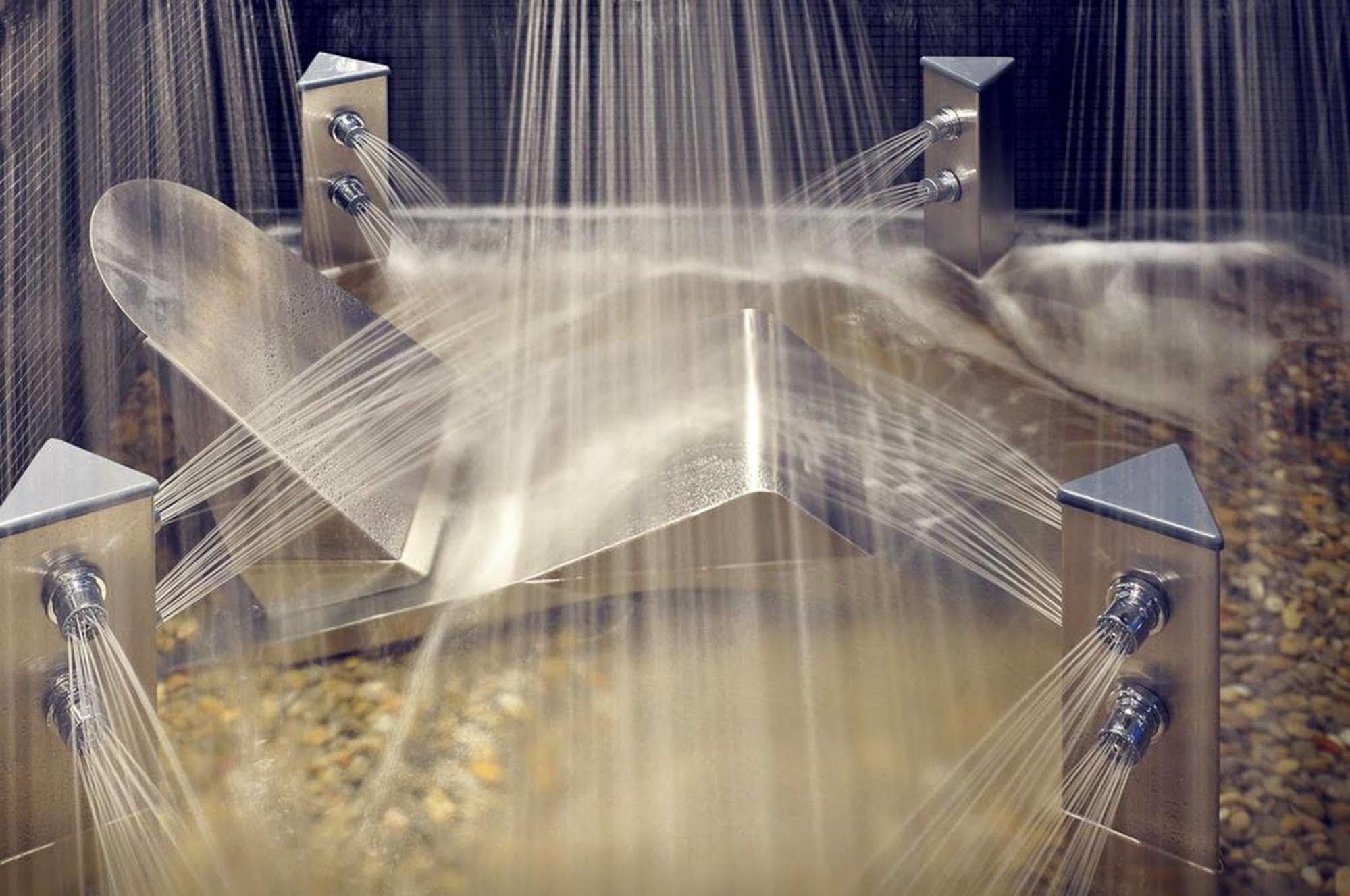 Sant Jordi Boutique Hotel Calella Exterior foto Spraying water on the surface of a rotating drum